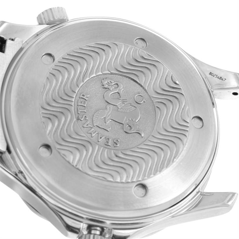 The image shows the back case of an Omega Seamaster 2254.50.00 Men's Stainless Steel Black Dial 2254.50.00 Men's Stainless Steel Black Dial watch, highlighting its embossed logo and wave pattern design.