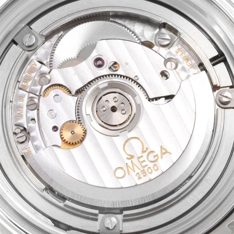 This close-up image shows the intricate inner mechanism of the Omega Seamaster 2220.80.00 Men
s Stainless Steel Blue Dial 2220.80.00 Men
s Stainless Steel Blue Dial 2500 model.