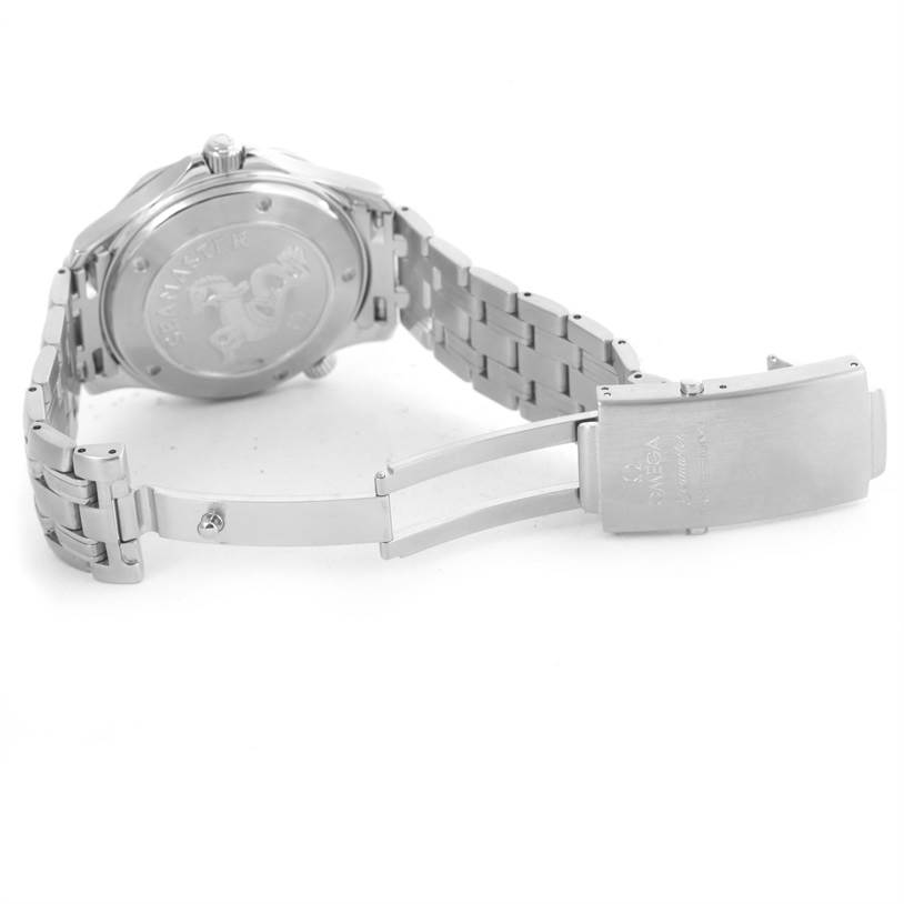 The image shows the back of the Omega Seamaster 2220.80.00 Men
s Stainless Steel Blue Dial 2220.80.00 Men
s Stainless Steel Blue Dial watch and its stainless steel bracelet clasp, photographed from a low angle.