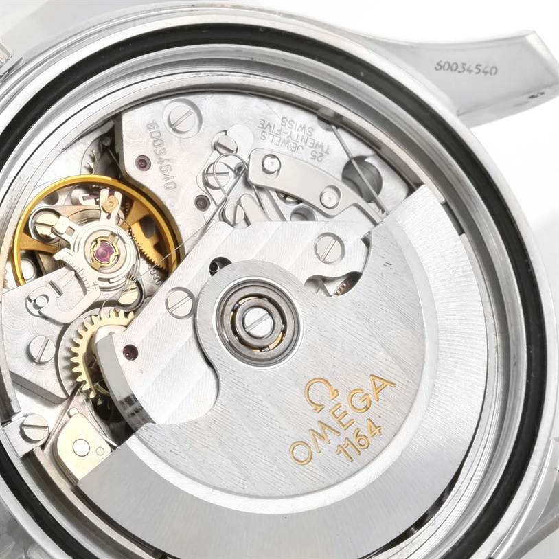 This image shows the mechanical movement, internal gears, and rotor of the Omega Seamaster 2599.80.00 Men
s Stainless Steel Blue Dial 2599.80.00 Men
s Stainless Steel Blue Dial watch.