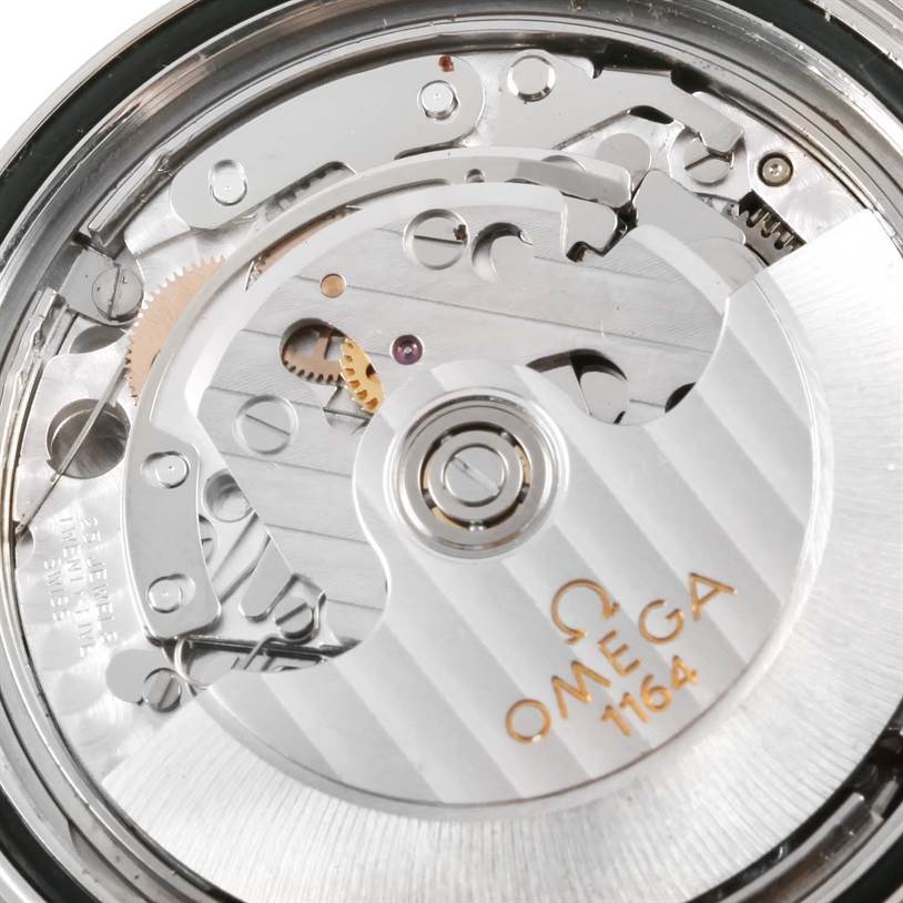 The image shows the internal mechanism of an Omega Seamaster 213.30.42.40.01.001 Men
s Stainless Steel Black Dial 213.30.42.40.01.001 Men
s Stainless Steel Black Dial 1164 model, viewed from the back of the watch.