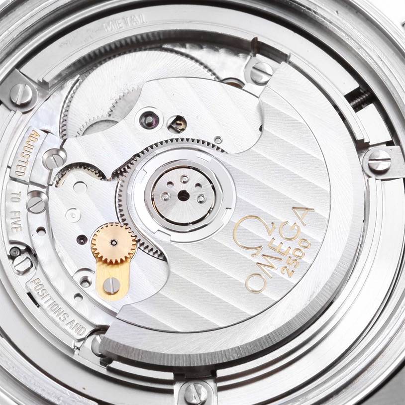 This image shows a close-up view of the intricate mechanical movement inside an Omega Seamaster 2226.80.00 Men
s Stainless Steel Blue Dial 2226.80.00 Men
s Stainless Steel Blue Dial watch.