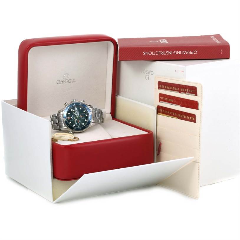 The Omega Seamaster 2599.80.00 Men
s Stainless Steel Blue Dial 2599.80.00 Men
s Stainless Steel Blue Dial watch is shown in its opened box with operating instructions and certification cards.