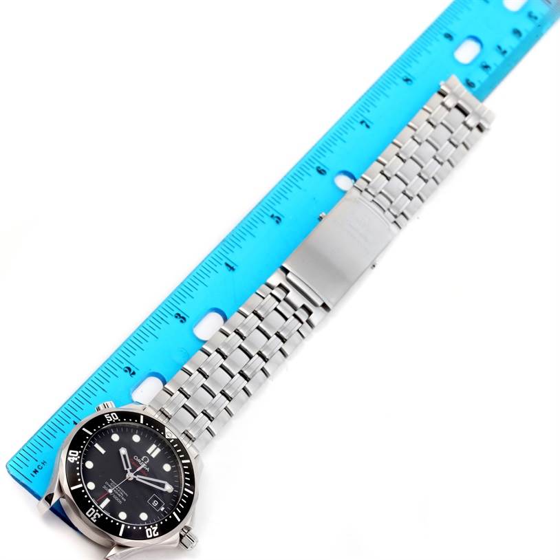 The image shows an Omega Seamaster 212.30.41.20.01.002 Men
s Stainless Steel Black Dial 212.30.41.20.01.002 Men
s Stainless Steel Black Dial watch with a ruler for scale, displaying the watch face, bezel, and metal bracelet.