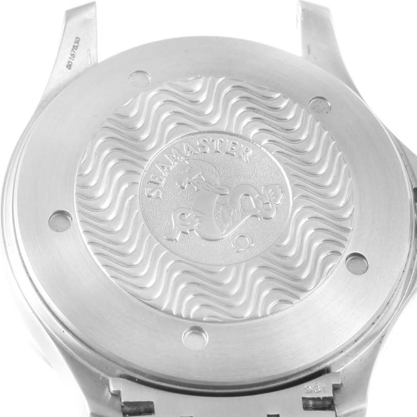 This is a close-up of the back case of an Omega Seamaster 2538.20.00 Men's Stainless Steel White Dial 2538.20.00 Men's Stainless Steel White Dial watch, showing its embossed logo and wavy design.