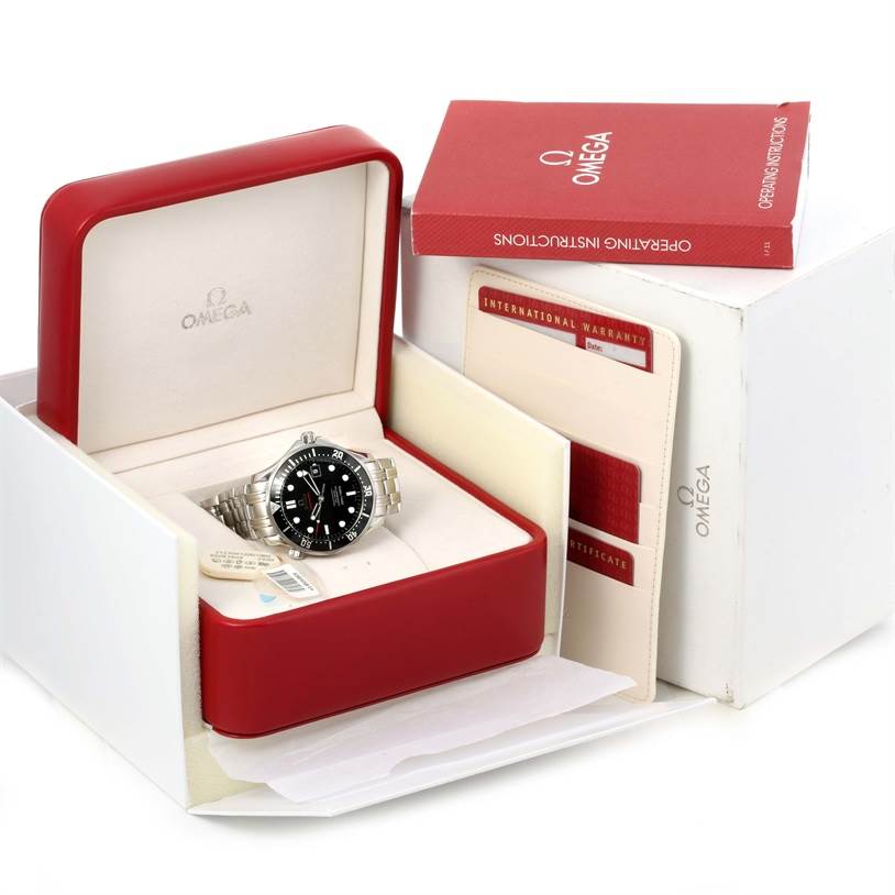 The image shows an Omega Seamaster 212.30.41.20.01.002 Men
s Stainless Steel Black Dial 212.30.41.20.01.002 Men
s Stainless Steel Black Dial watch at an angled top view, inside its open red box with warranty cards and instruction booklets.