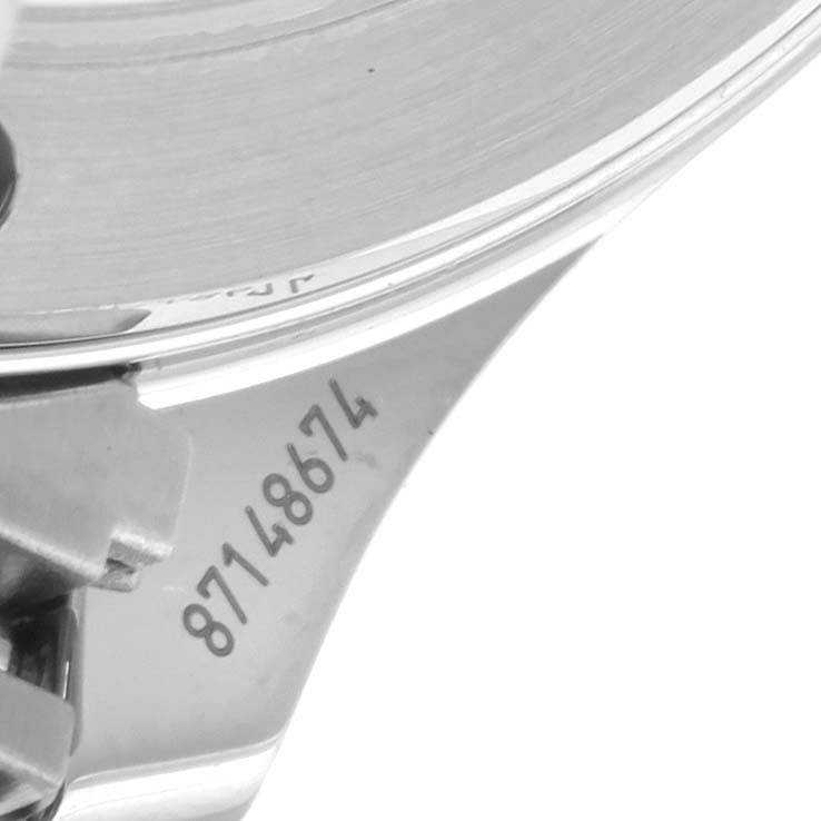 The image shows a close-up of the partial case and serial number of an Omega Seamaster 212.30.41.20.03.001 Men
s Stainless Steel Blue Dial 212.30.41.20.03.001 Men
s Stainless Steel Blue Dial watch.