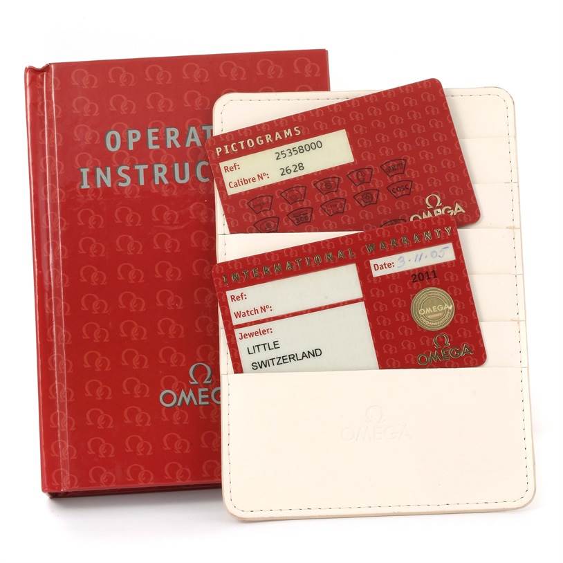 The image shows the operation instruction manual and warranty cards for an Omega Seamaster 2535.80.00 Men
s Stainless Steel Blue Dial 2535.80.00 Men
s Stainless Steel Blue Dial watch.