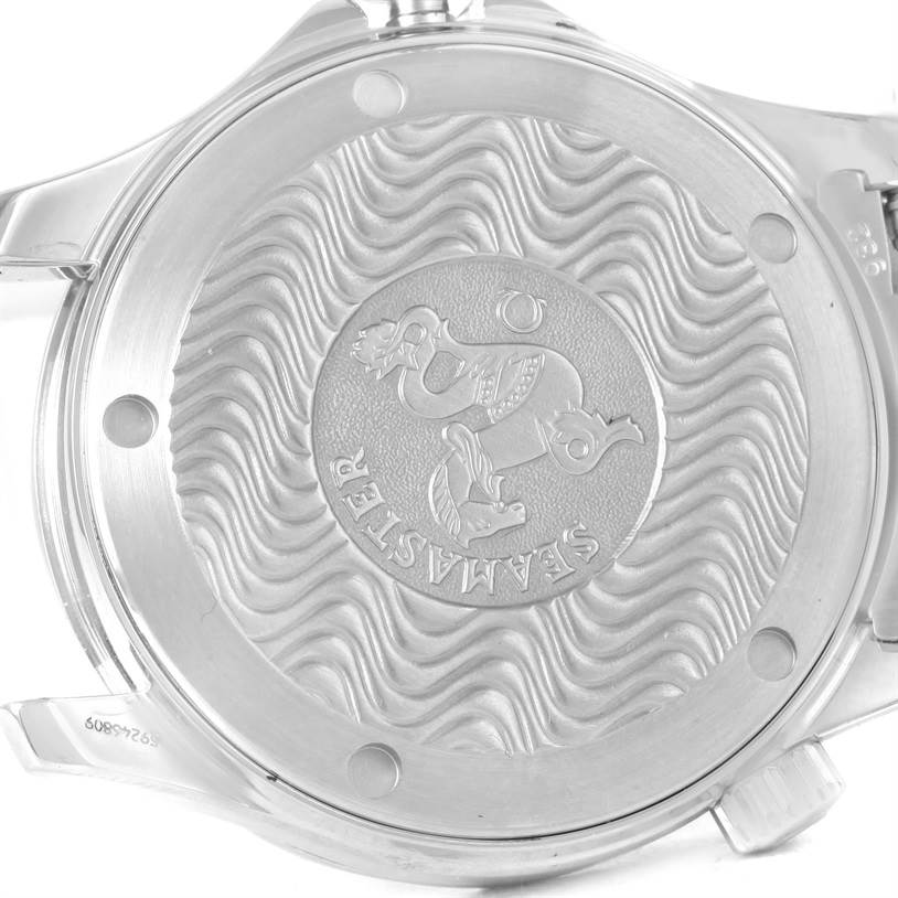 The image shows the back of an Omega Seamaster 2262.50.00 Men
s Stainless Steel Black Dial 2262.50.00 Men
s Stainless Steel Black Dial watch, highlighting its engraved design.