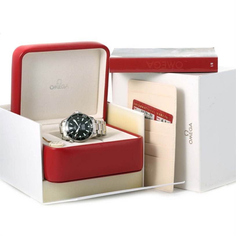 The Omega Seamaster 2254.50.00 Men
s Stainless Steel Black Dial 2254.50.00 Men
s Stainless Steel Black Dial watch is displayed inside an open red box with accessories including a cardholder and a booklet.