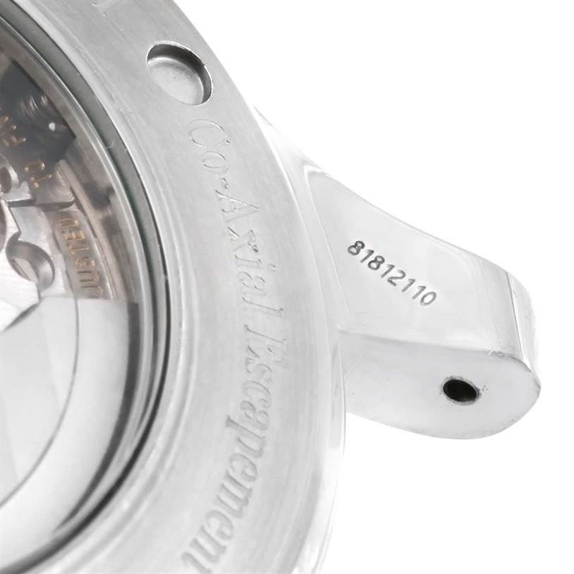 The image shows a close-up of the back and the lugs of an Omega Seamaster 2535.80.00 Men
s Stainless Steel Blue Dial 2535.80.00 Men
s Stainless Steel Blue Dial watch, highlighting the "Co-Axial Escapement" engraving.