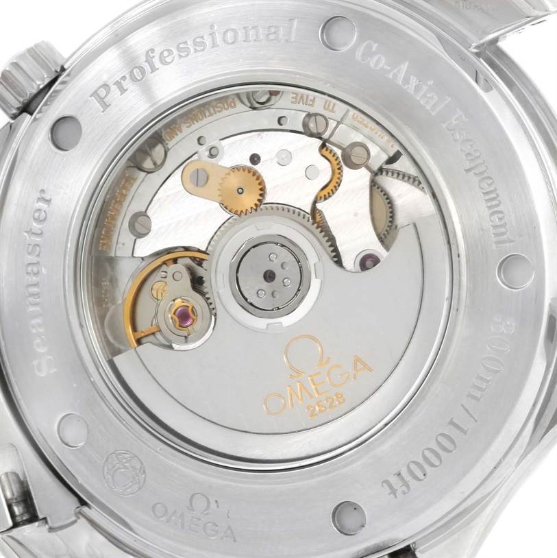 The image shows the back view of the Omega Seamaster 2535.80.00 Men
s Stainless Steel Blue Dial 2535.80.00 Men
s Stainless Steel Blue Dial watch, revealing its inner mechanical parts and inscriptions.