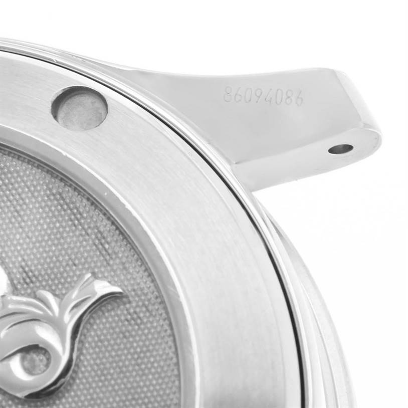 The image shows a close-up of the case back and lug of an Omega Seamaster 2222.80.00 Men
s Stainless Steel Blue Dial 2222.80.00 Men
s Stainless Steel Blue Dial watch, highlighting the serial number and partial Sea-Horse logo.