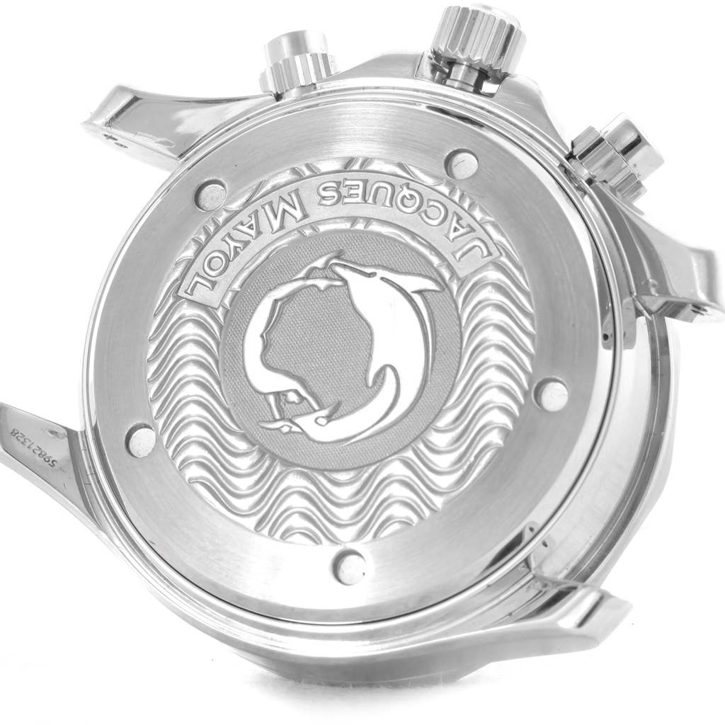 The image shows the back case of an Omega Seamaster 2595.30.00 Men
s Stainless Steel Silver Dial 2595.30.00 Men
s Stainless Steel Silver Dial watch with its intricate engraving and crown.