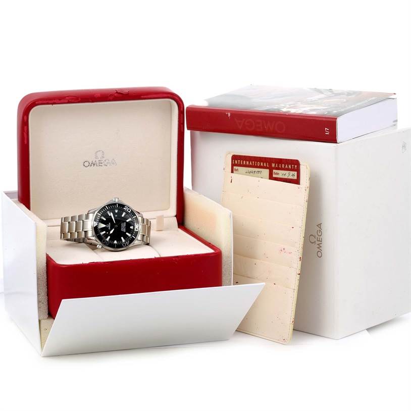 The image shows an Omega Seamaster 2264.50.00 Men
s Stainless Steel Black Dial 2264.50.00 Men
s Stainless Steel Black Dial watch in its open red box with accompanying warranty cards and outer packaging.