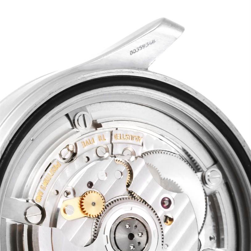 The image shows a close-up side view of the internal mechanical parts of an Omega Seamaster 2538.20.00 Men's Stainless Steel White Dial 2538.20.00 Men's Stainless Steel White Dial watch.