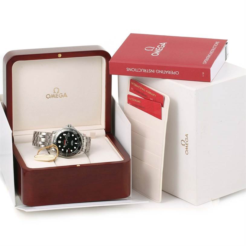 The image shows an Omega Seamaster 212.30.41.20.01.003 Men
s Stainless Steel Black Dial 212.30.41.20.01.003 Men
s Stainless Steel Black Dial watch inside its open box, alongside the operating instructions and international warranty cards.