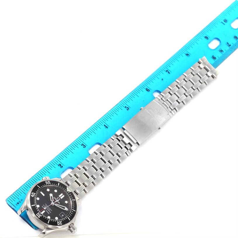 The Omega Seamaster 212.30.36.20.01.001 Men
s Stainless Steel Black Dial 212.30.36.20.01.001 Men
s Stainless Steel Black Dial watch is shown horizontally against a ruler, displaying its face and stainless steel bracelet band.