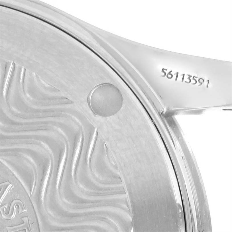 This close-up image shows the Omega Seamaster 2561.80.00 Men
s Stainless Steel Blue Dial 2561.80.00 Men
s Stainless Steel Blue Dial watch case back and part of the lug area with a serial number engraved.