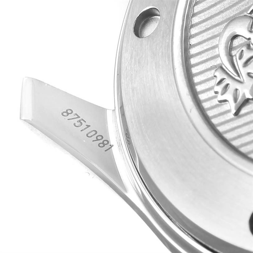 The image shows the back case and serial number of an Omega Seamaster 212.30.41.20.01.003 Men
s Stainless Steel Black Dial 212.30.41.20.01.003 Men
s Stainless Steel Black Dial watch.