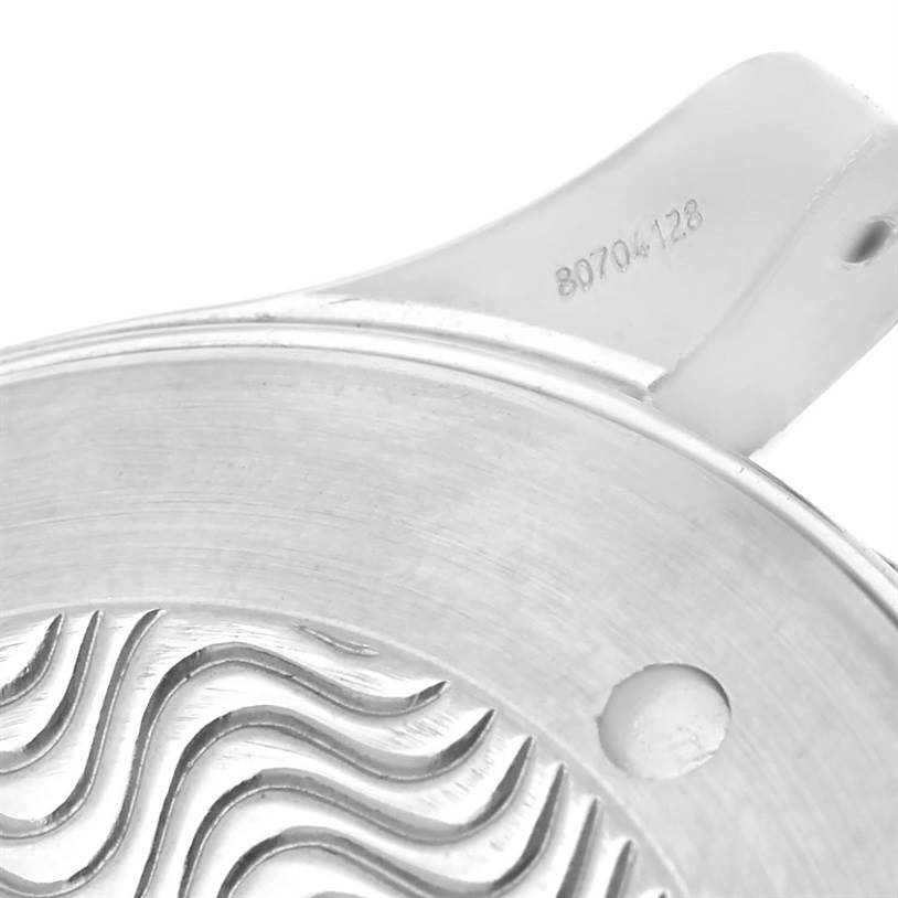 This image shows a close-up of the case back and lug of the Omega Seamaster 2455.80.00 Men
s Stainless Steel Blue Dial 2455.80.00 Men
s Stainless Steel Blue Dial watch, highlighting the serial number engraving and wave pattern.