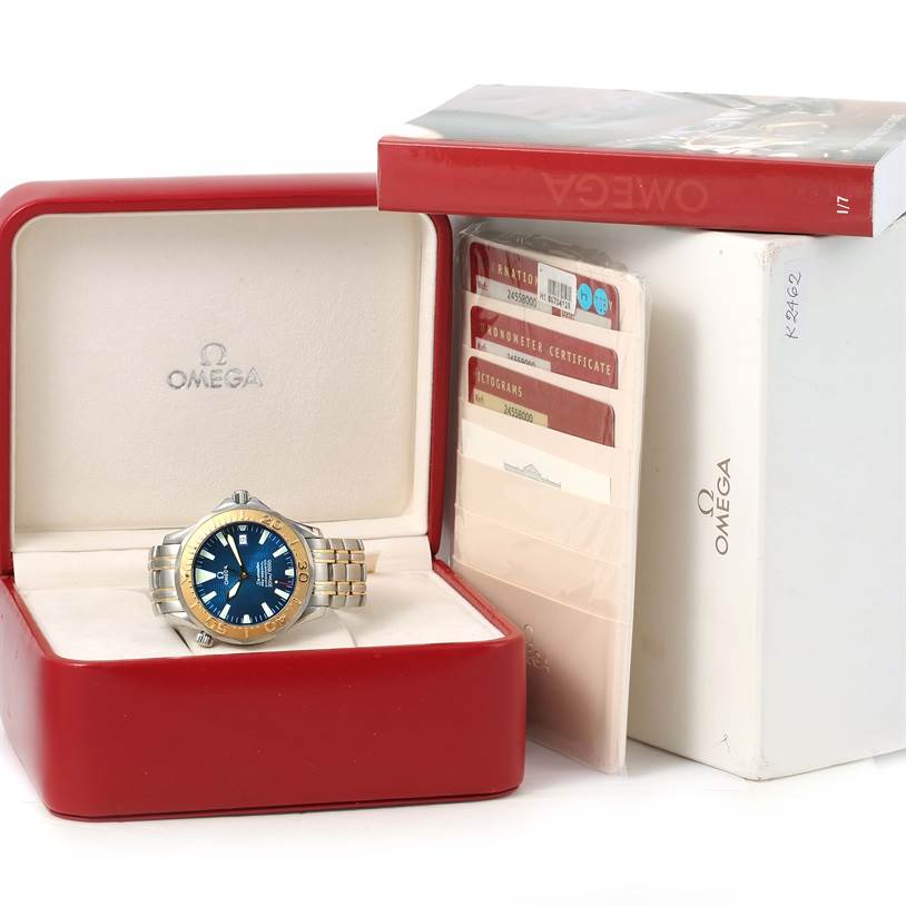 The Omega Seamaster 2455.80.00 Men
s Stainless Steel Blue Dial 2455.80.00 Men
s Stainless Steel Blue Dial watch is displayed in an open case with documentation and packaging visible.