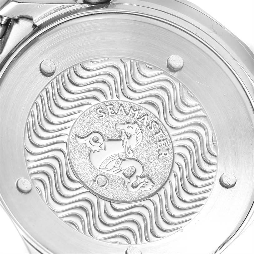 The image shows the case back of an Omega Seamaster 2455.80.00 Men
s Stainless Steel Blue Dial 2455.80.00 Men
s Stainless Steel Blue Dial watch with its signature wavy pattern and engraved logo.