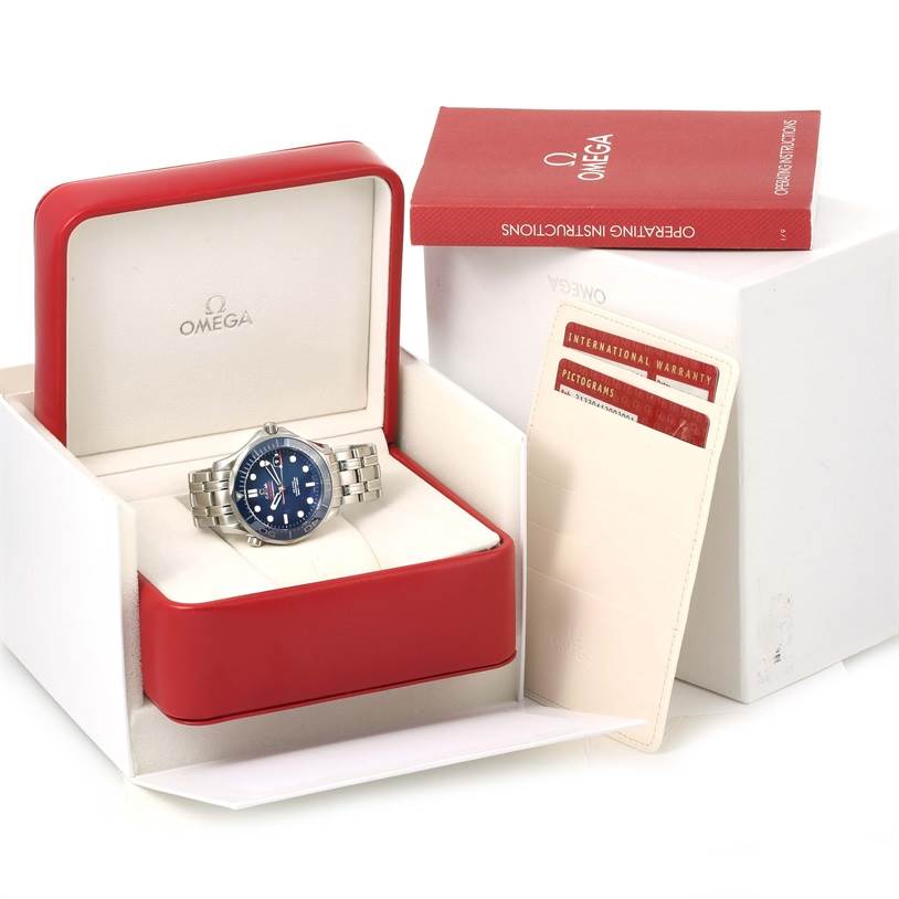 The Omega Seamaster 212.30.41.20.03.001 Men
s Stainless Steel Blue Dial 212.30.41.20.03.001 Men
s Stainless Steel Blue Dial watch is shown in its opened box, alongside a warranty card and an operating instructions booklet.