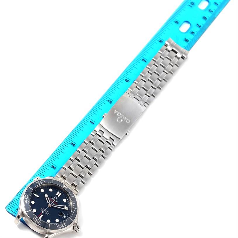 The image shows an Omega Seamaster 212.30.41.20.03.001 Men
s Stainless Steel Blue Dial 212.30.41.20.03.001 Men
s Stainless Steel Blue Dial watch laid flat, highlighting the watch face, stainless steel bracelet, and clasp next to a ruler.