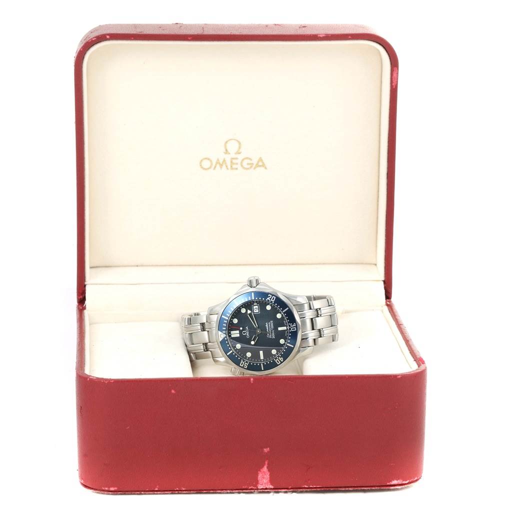 The image shows an Omega Seamaster 2561.80.00 Men
s Stainless Steel Blue Dial 2561.80.00 Men
s Stainless Steel Blue Dial watch positioned inside an open Omega watch box.