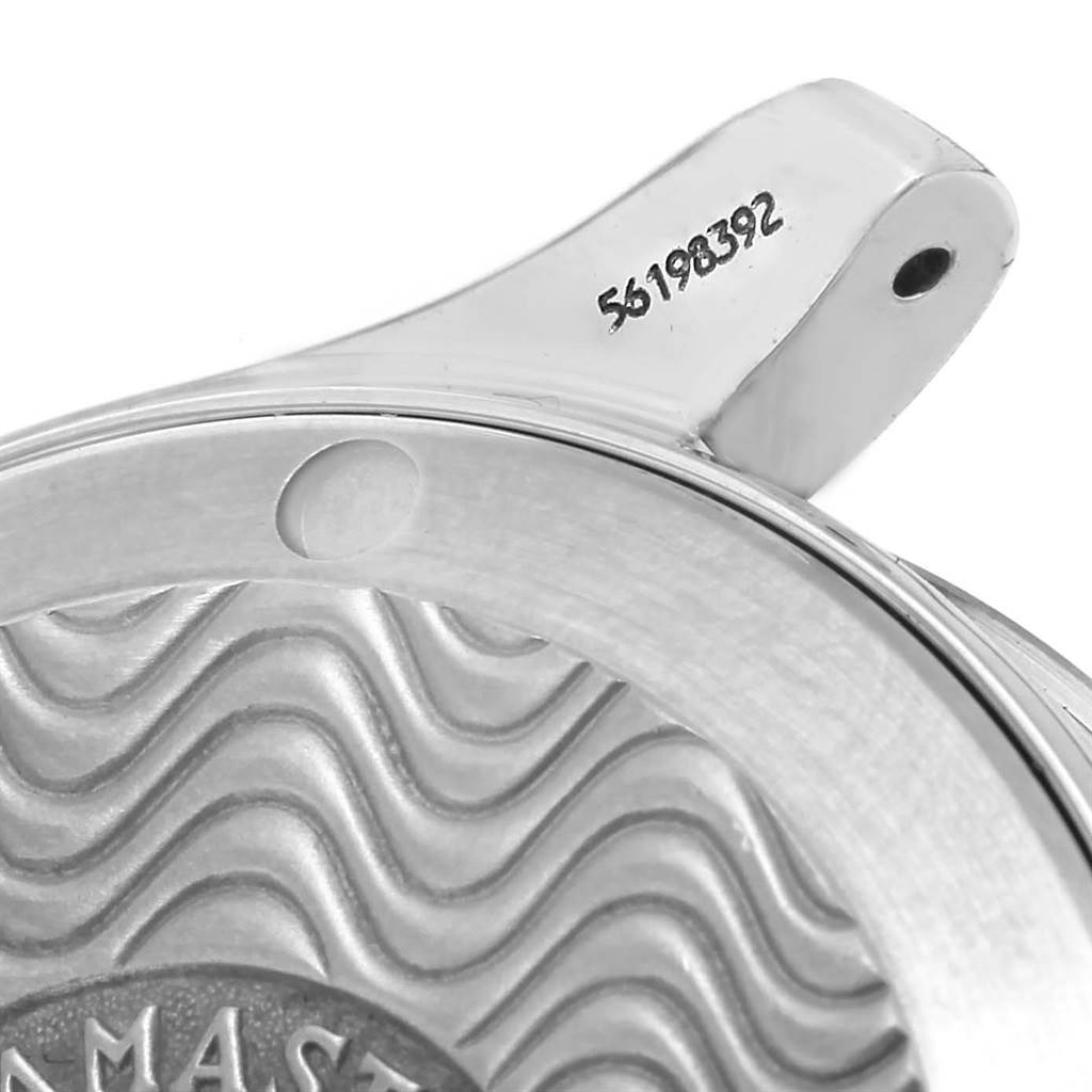 This image shows a close-up view of the case back edge and a lug of the Omega Seamaster 2561.80.00 Men
s Stainless Steel Blue Dial 2561.80.00 Men
s Stainless Steel Blue Dial watch, displaying its serial number.