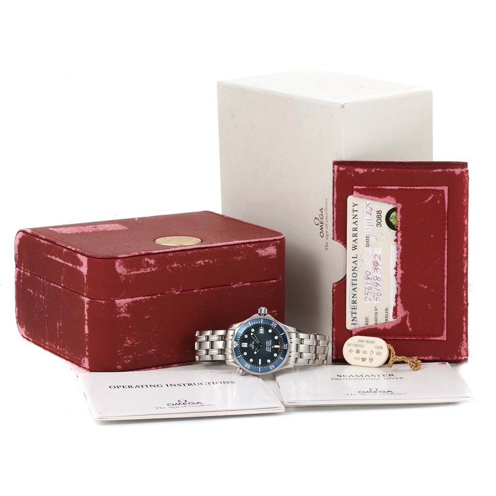 This image shows an Omega Seamaster 2561.80.00 Men
s Stainless Steel Blue Dial 2561.80.00 Men
s Stainless Steel Blue Dial watch with its box, warranty card, and instruction manuals from a front angle.