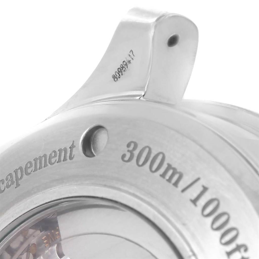 The image shows the case back of an Omega Seamaster 2535.80.00 Men
s Stainless Steel Blue Dial 2535.80.00 Men
s Stainless Steel Blue Dial watch, focusing on the water resistance engravings.