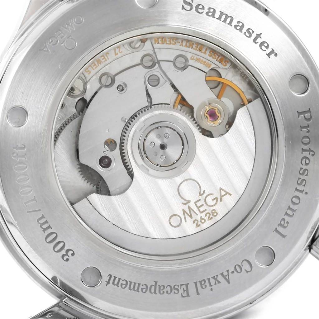 The image shows the back view of the Omega Seamaster 2535.80.00 Men
s Stainless Steel Blue Dial 2535.80.00 Men
s Stainless Steel Blue Dial watch, highlighting its Co-Axial escapement and intricate mechanical movement.