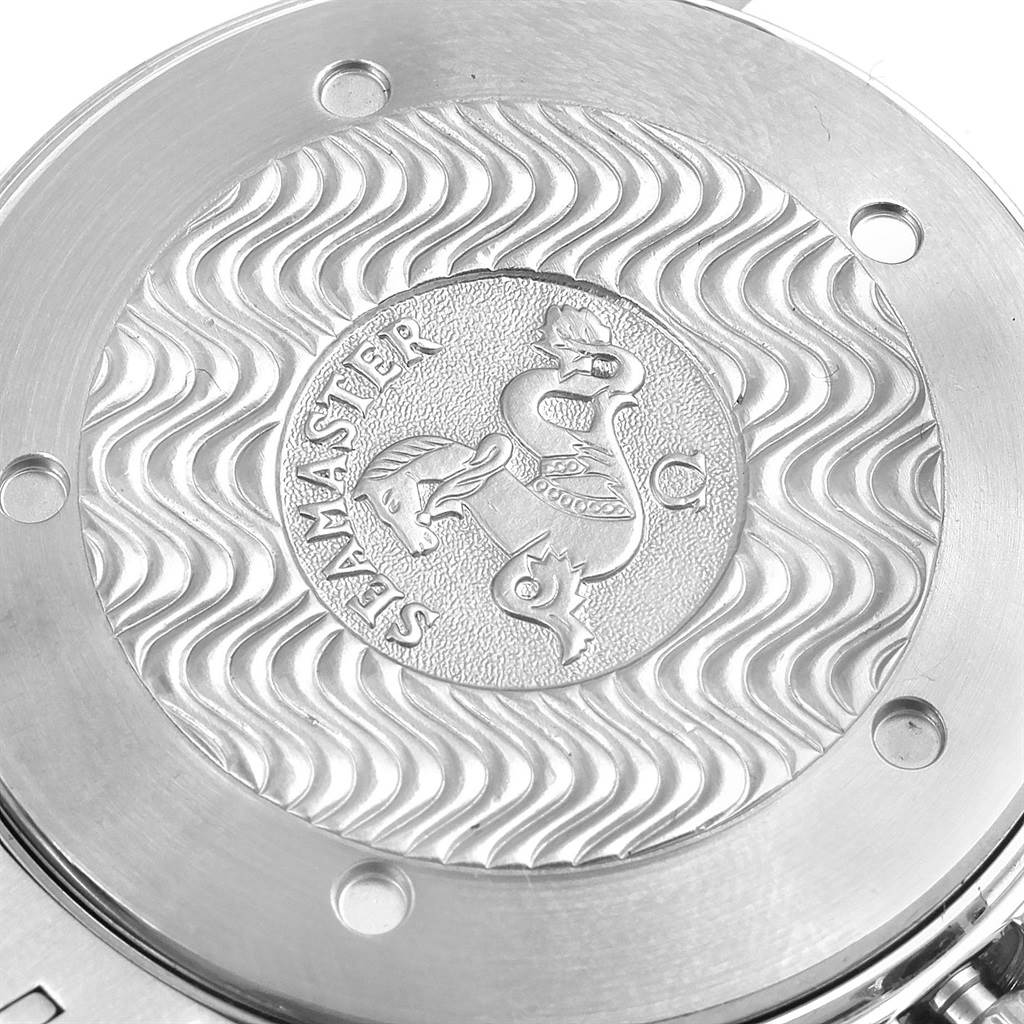 The image shows the close-up view of the case back of the Omega Seamaster 2255.80.00 Men
s Stainless Steel Blue Dial 2255.80.00 Men
s Stainless Steel Blue Dial watch featuring an engraved design.