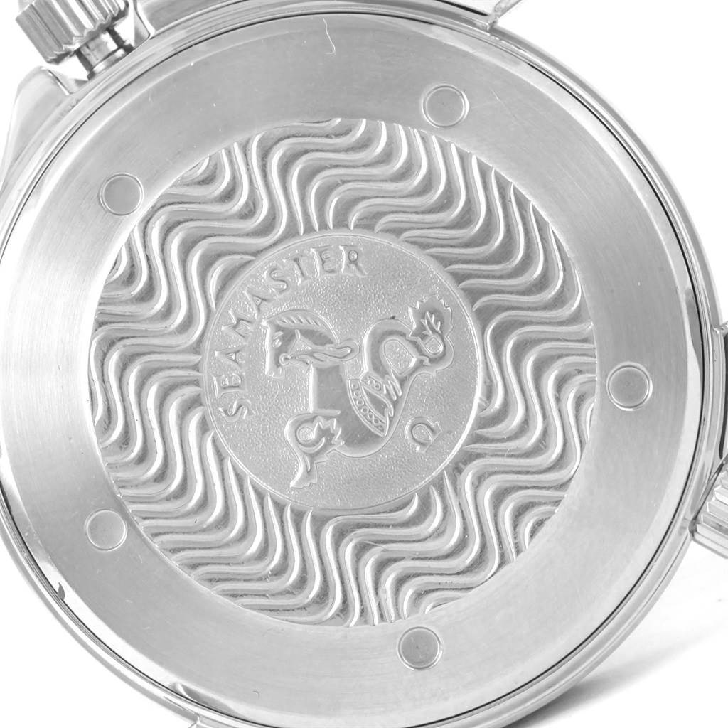 This image shows the case back of an Omega Seamaster 2531.80.00 Men
s Stainless Steel Blue Dial 2531.80.00 Men
s Stainless Steel Blue Dial watch, highlighting its intricate wave pattern and engraved logo.