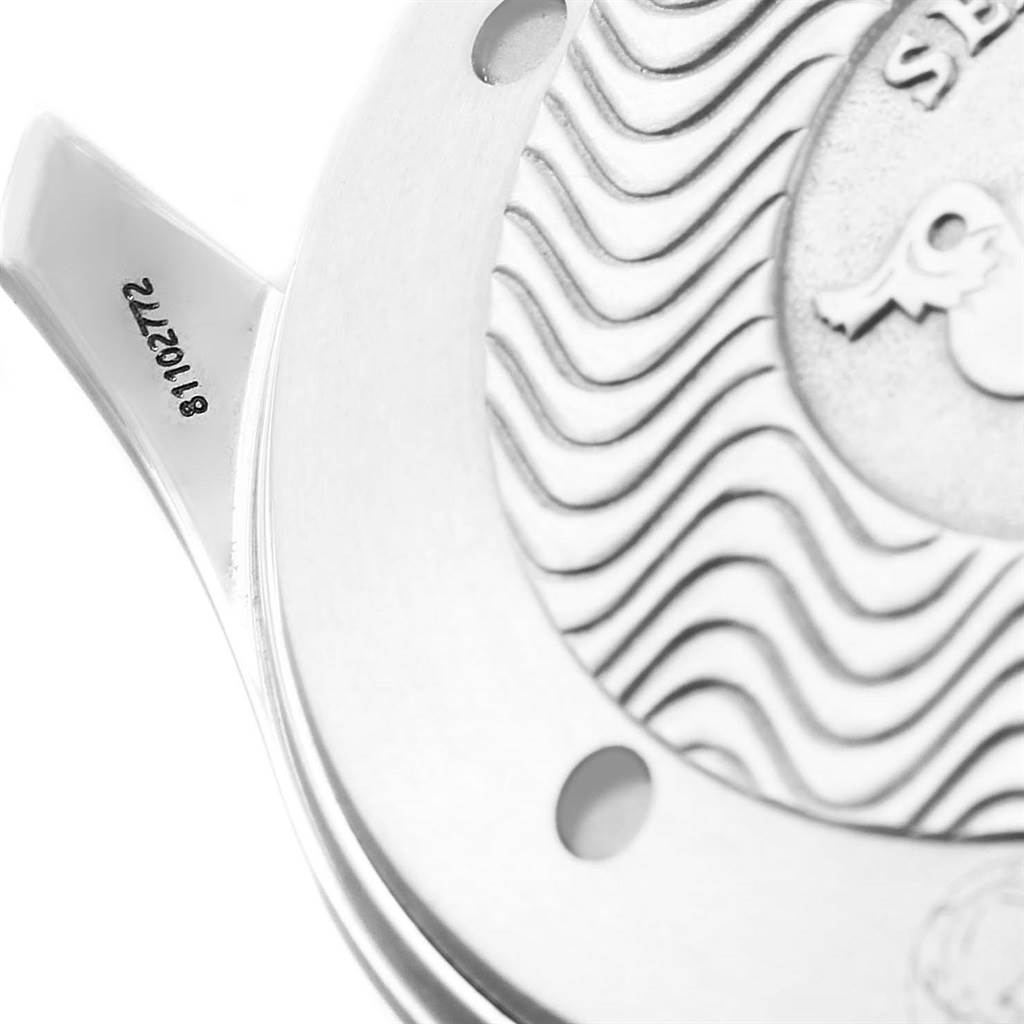 The image shows a close-up of the back casing and part of the lugs of an Omega Seamaster 2531.80.00 Men
s Stainless Steel Blue Dial 2531.80.00 Men
s Stainless Steel Blue Dial watch, highlighting its serial number and wave pattern.