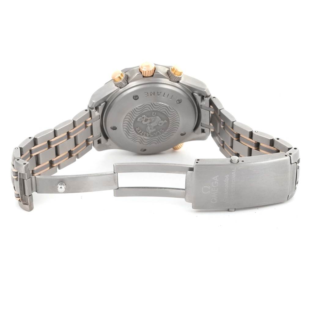 The image shows the back view of an Omega Seamaster 2296.80.00 Men
s Titanium Blue Dial 2296.80.00 Men
s Titanium Blue Dial watch, highlighting its clasp, case back, and bracelet.