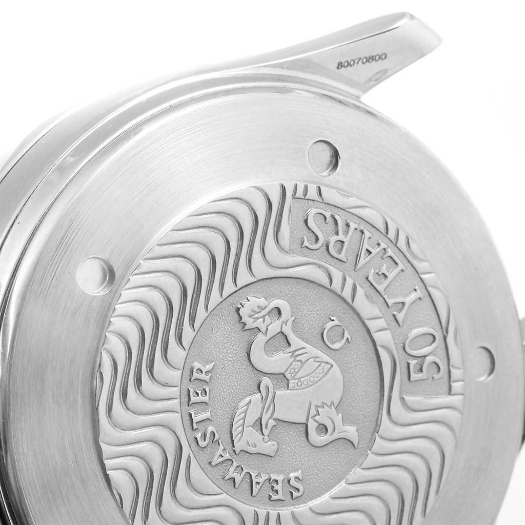 The image shows the case back of an Omega Seamaster 2534.50.00 Men
s Stainless Steel Black Dial 2534.50.00 Men
s Stainless Steel Black Dial watch, highlighting its engraved logo and "50 Years" text.