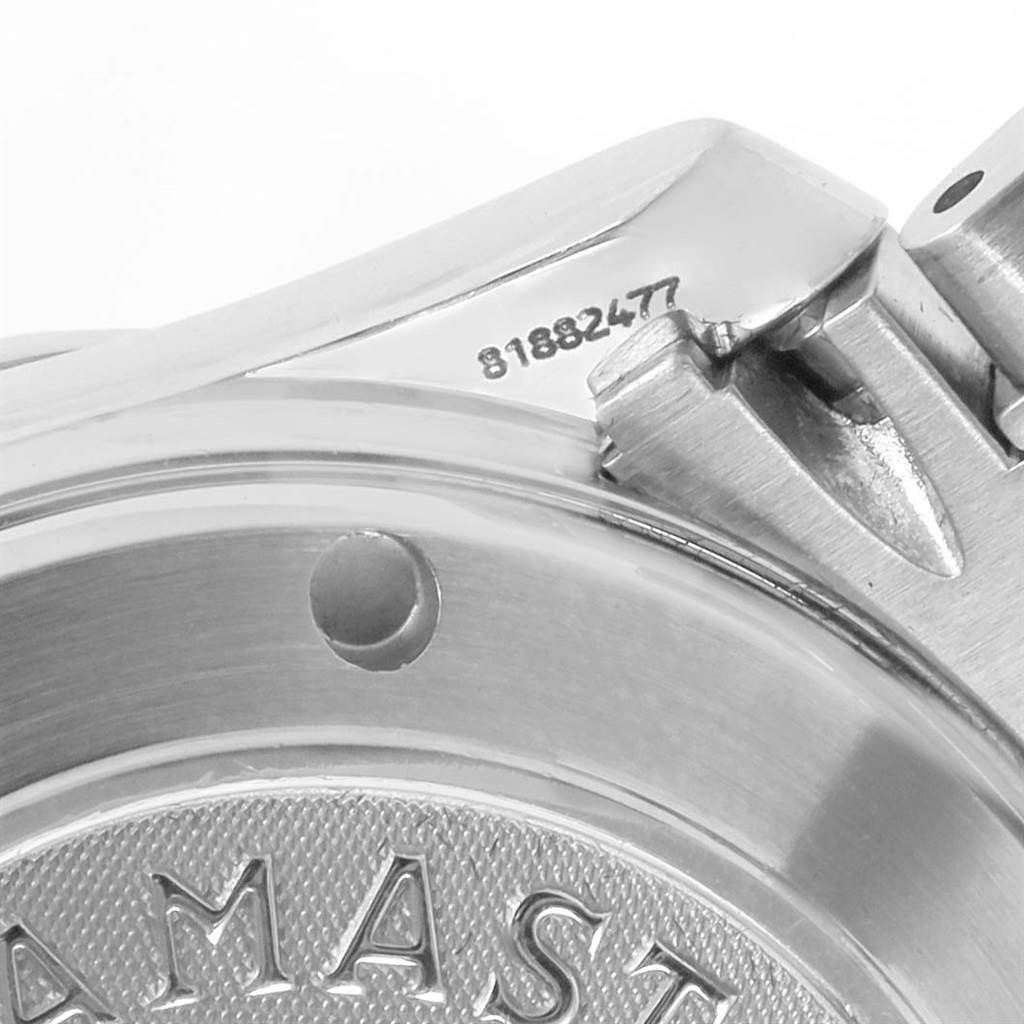 The image shows a close-up of the back case and part of the bracelet of an Omega Seamaster 2222.80.00 Men
s Stainless Steel Blue Dial 2222.80.00 Men
s Stainless Steel Blue Dial watch, including the model inscription and serial number.