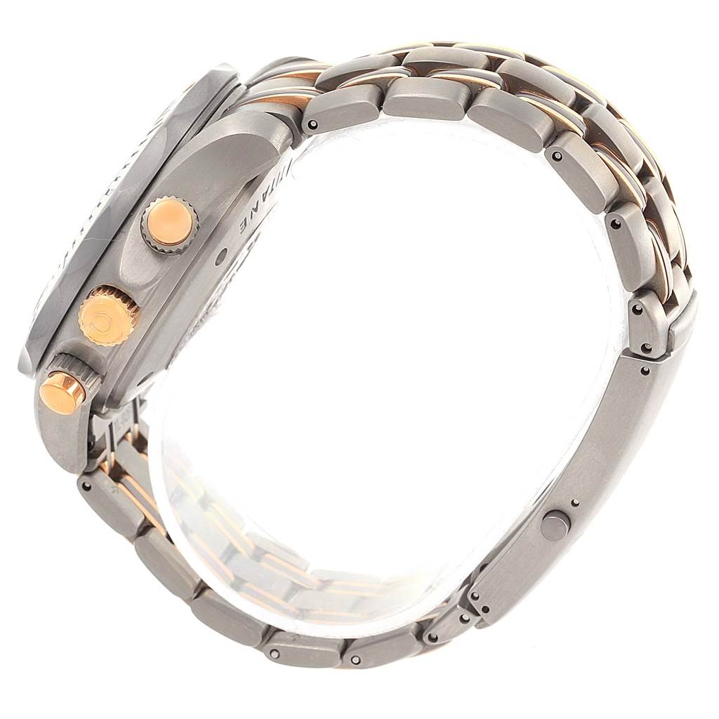 The image shows a side view of the Omega Seamaster 2296.80.00 Men
s Titanium Blue Dial 2296.80.00 Men
s Titanium Blue Dial with its crown, pushers, and metal bracelet.