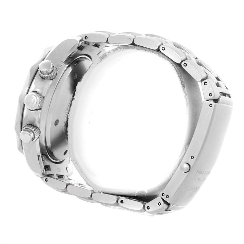 The image shows a side view of an Omega Seamaster 2599.80.00 Men
s Stainless Steel Blue Dial 2599.80.00 Men
s Stainless Steel Blue Dial watch, highlighting its metallic bracelet, case, and pushers.