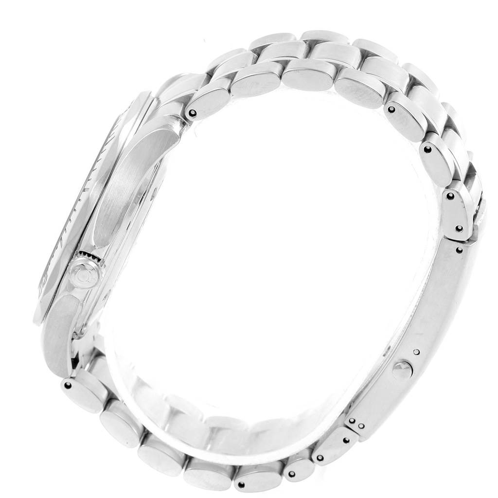 The image shows a side view of the Omega Seamaster 2265.80.00 Men
s Stainless Steel Blue Dial 2265.80.00 Men
s Stainless Steel Blue Dial watch, highlighting its case, crown, and metal bracelet.