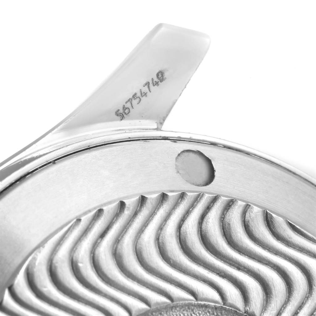 The image shows a close-up of the case back and some of the engraved serial number of the Omega Seamaster 2561.80.00 Men
s Stainless Steel Blue Dial 2561.80.00 Men
s Stainless Steel Blue Dial watch.