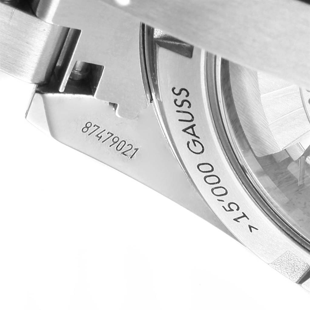 This image shows a close-up of the case back of an Omega Seamaster 233.32.41.21.01.001 Men's Stainless Steel Black Dial 233.32.41.21.01.001 Men's Stainless Steel Black Dial, highlighting the "15,000 GAUSS" marking and serial number.