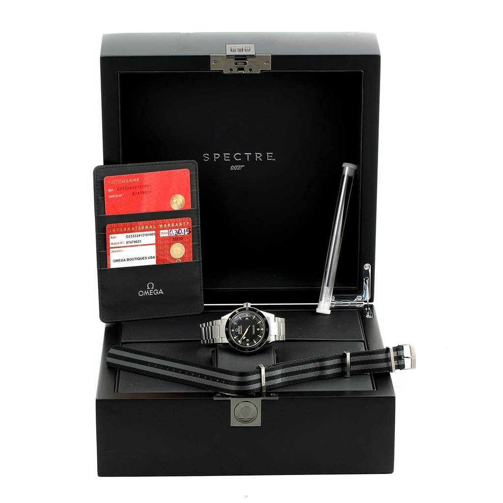 The Omega Seamaster 233.32.41.21.01.001 Men's Stainless Steel Black Dial 233.32.41.21.01.001 Men's Stainless Steel Black Dial watch is shown from the front, inside a box with warranty cards and an additional striped watch strap.