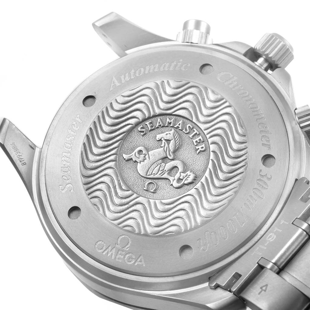 The image shows the case back of an Omega Seamaster 2269.52.00 Men's Titanium Black Dial 2269.52.00 Men's Titanium Black Dial watch, highlighting its engraved logo and text.