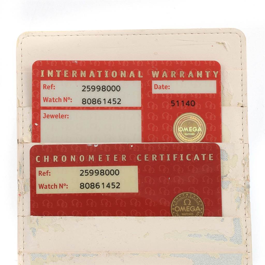 The image shows the international warranty and chronometer certificate cards for an Omega Seamaster 2599.80.00 Men
s Stainless Steel Blue Dial 2599.80.00 Men
s Stainless Steel Blue Dial watch.