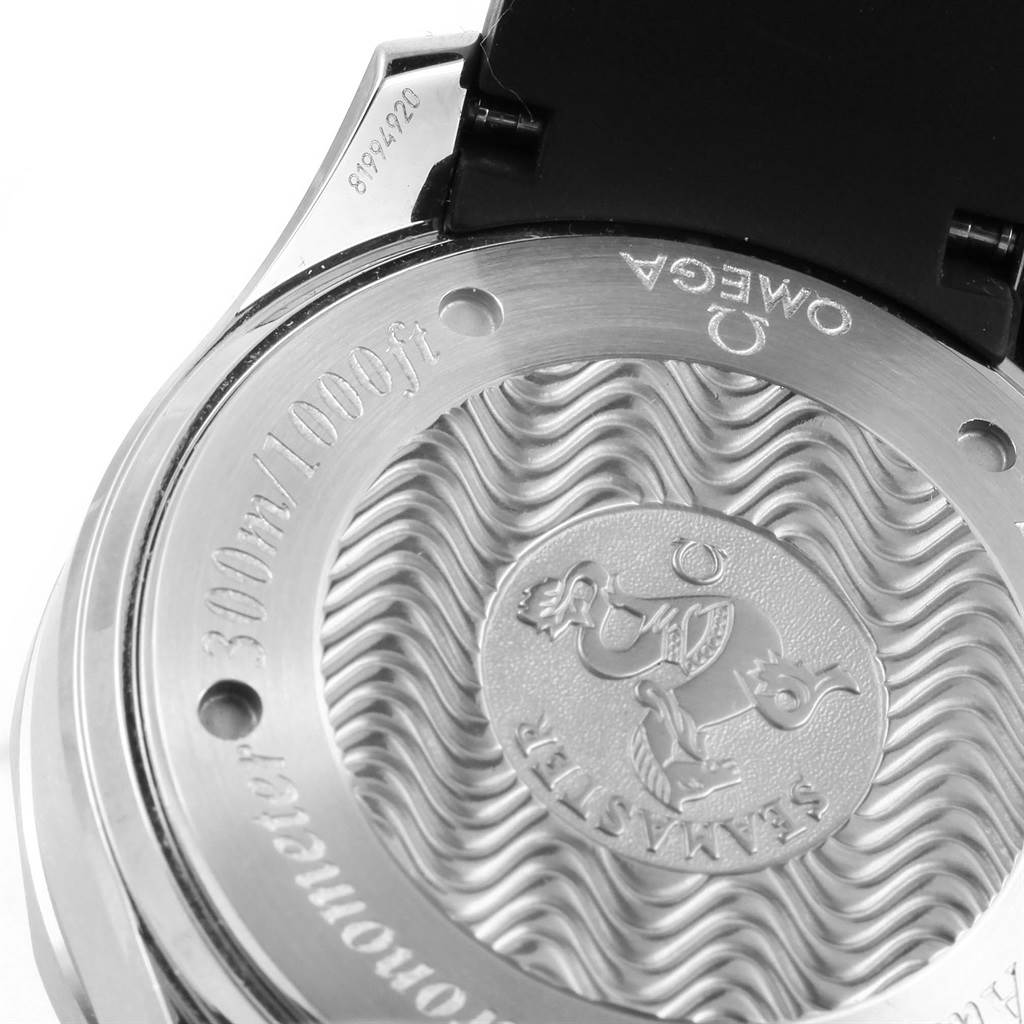This image shows the engraved case back of the Omega Seamaster 2569.52.00 Men
s Stainless Steel Black Dial 2569.52.00 Men
s Stainless Steel Black Dial watch, highlighting its water resistance and unique wave pattern.
