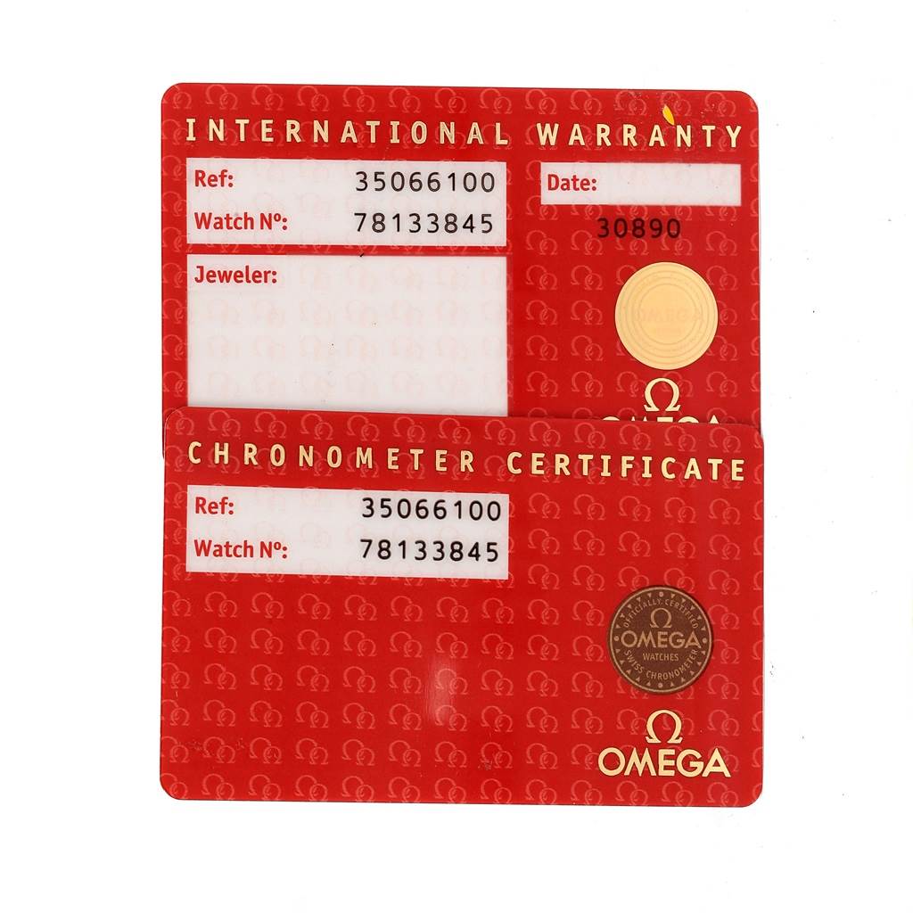 The image shows the International Warranty and Chronometer Certificate cards for an Omega Seamaster 3506.61.00 Men's Stainless Steel Red Dial 3506.61.00 Men's Stainless Steel Red Dial watch.